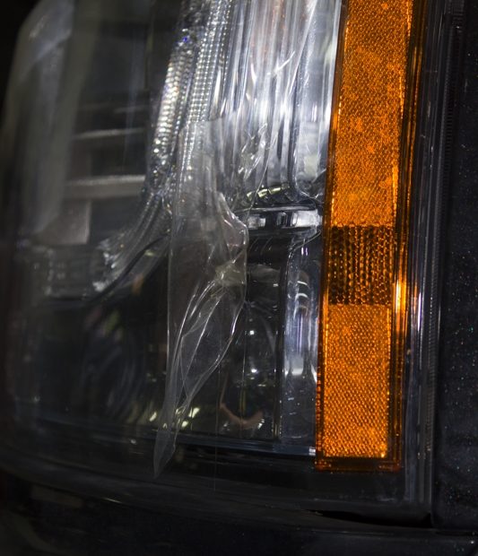 Нанесение защитной пленки на фары Land Rover Discovery 4